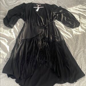 Elegant Black Dress with Fringe Detail